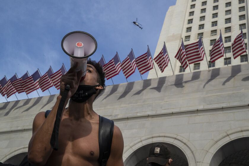 Los Angeles, CA, Tuesday, June 2, 2020 - Marcus Owen, with bullhorn, leads a rally for George Floyd as hundreds of protesters gather outside City Hall in a daylong protest. (Robert Gauthier / Los Angeles Times)