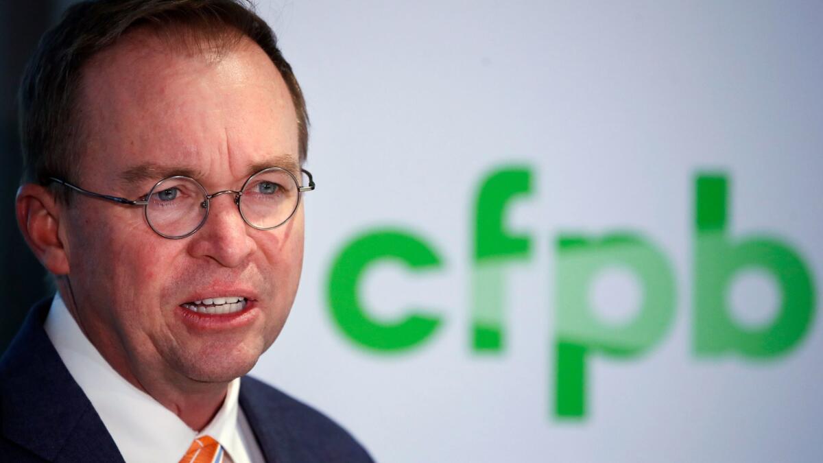 Mick Mulvaney speaks during a news conference Monday at the Consumer Financial Protection Bureau after President Trump tapped him to be acting director of the independent watchdog agency.