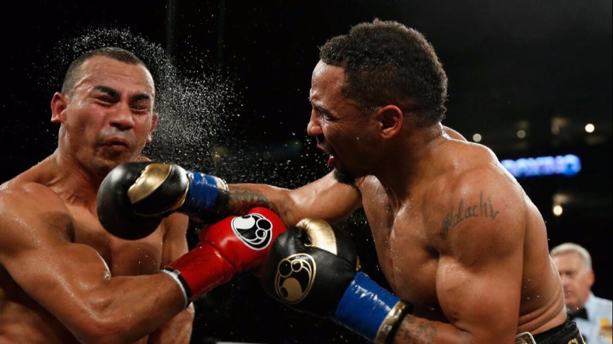 Andre Ward hits Alexander Brand with a right hand during their WBO Intercontinental light-heavyweight title bout on Aug. 6.