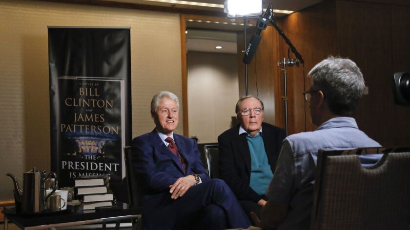 Former President Bill Clinton, left, and author James Patterson during a May 21 interview about their new novel, "The President is Missing,"
