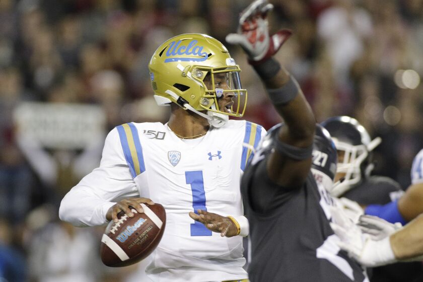 UCLA quarterback Dorian Thompson-Robinson (1) prepares to pass the ball during the first half of an NCAA college football game against Washington State in Pullman, Wash., Saturday, Sept. 21, 2019. (AP Photo/Young Kwak)