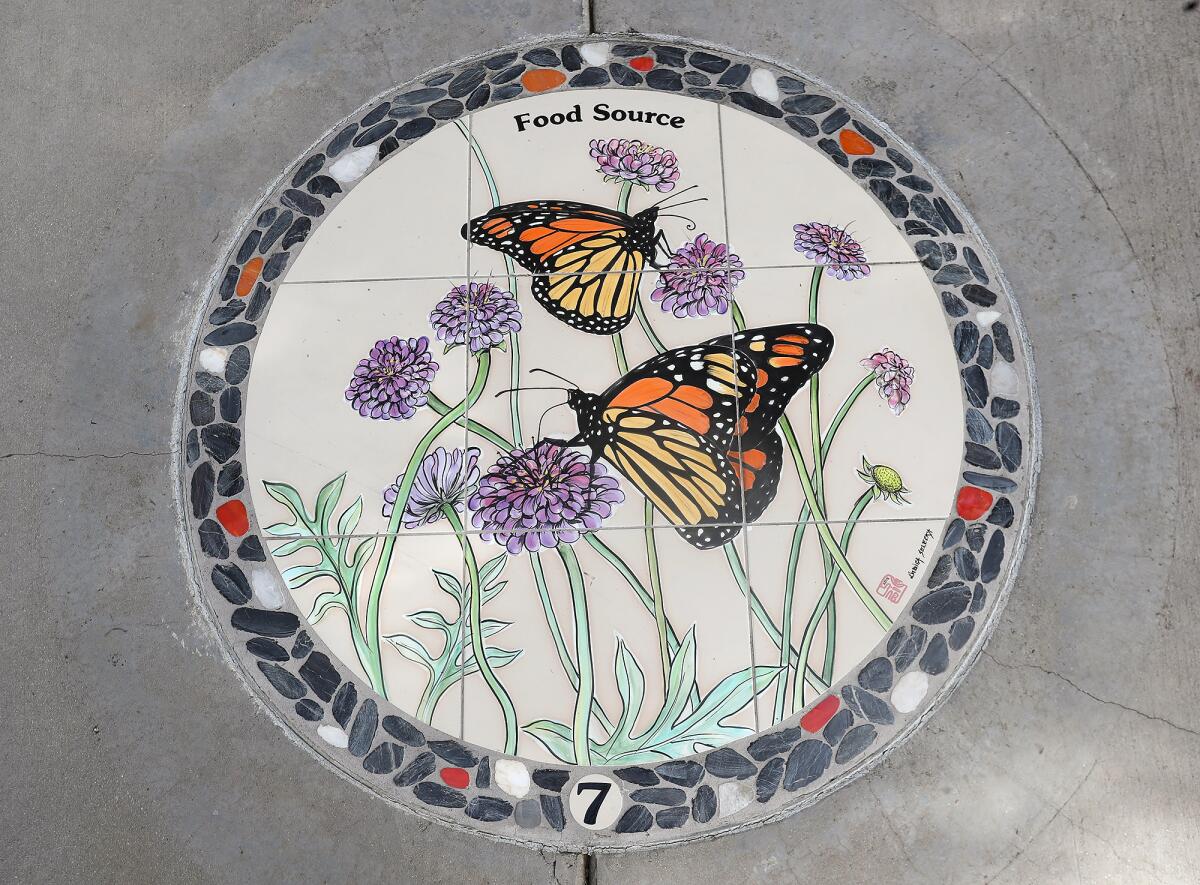 Educational tiles of monarch butterflies are featured at Norma Gibbs Butterfly Park in Huntington Beach.