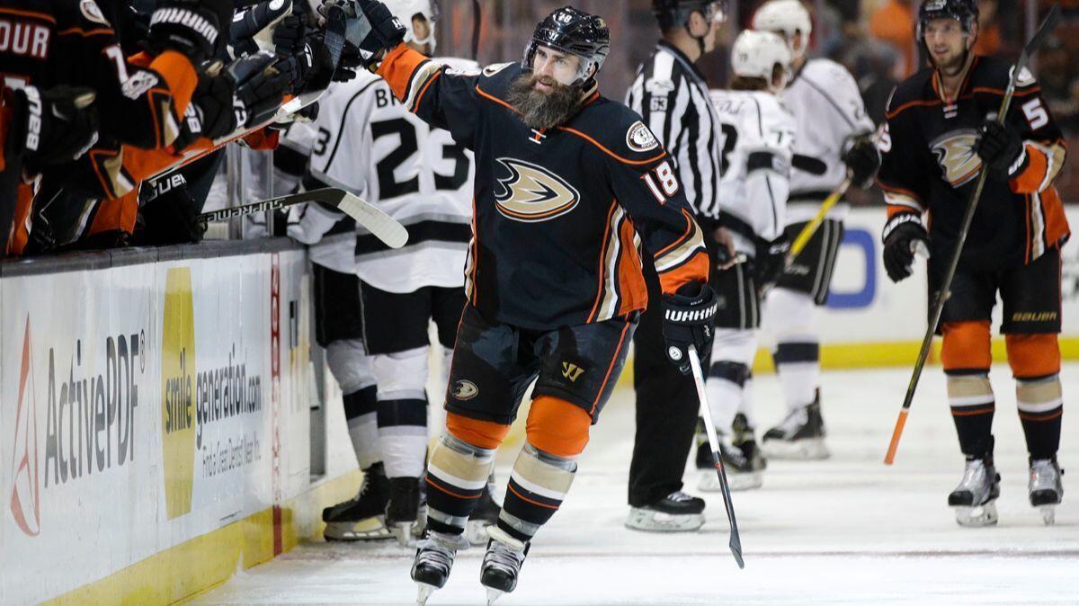 The Ducks' Patrick Eaves (18) celebrates his first-period goal against the Kings on Sunday.