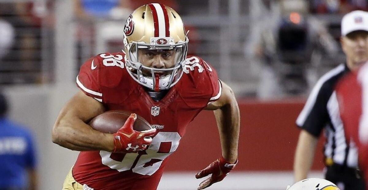 San Francisco running back Jarryd Hayne carries the ball during the second half of a preseason game against San Diego on Sept. 3.