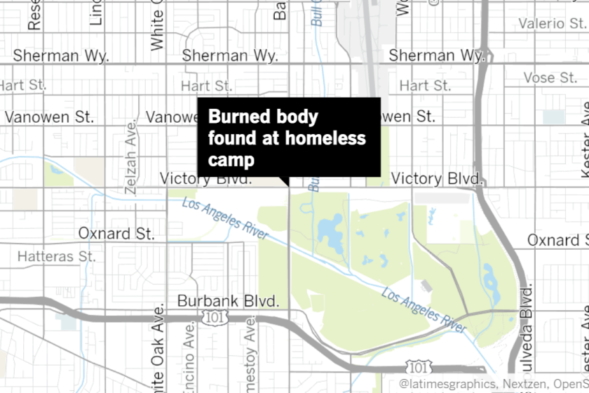 A burned body was found in a homeless camp in Van Nuys, and Los Angeles police are investigating the case as a homicide, a law enforcement official told The Times.