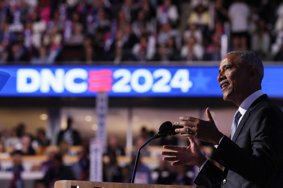 Former President Obama delivers a speech at the Democratic National Convention at the United Center in Chicago.