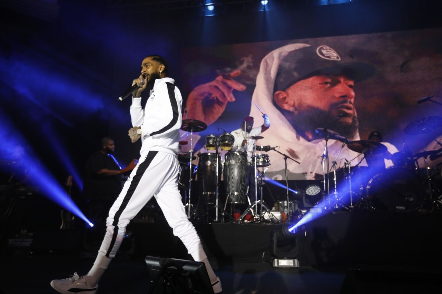 Nipsey Hussle, shown at the Hollywood Palladium, was known as much for his work in the community as for his music.