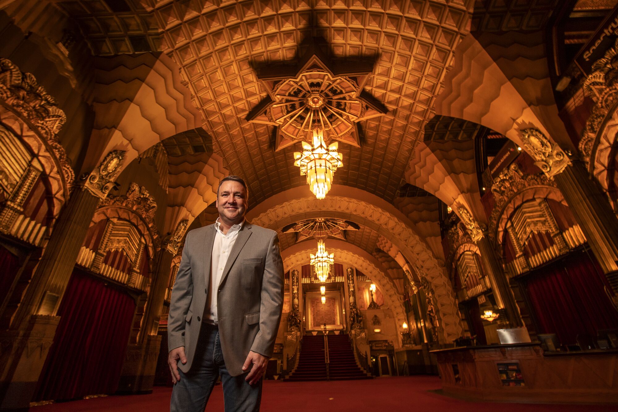 Jeff Loeb inside the grand lobby of the Pantages Theatre 
