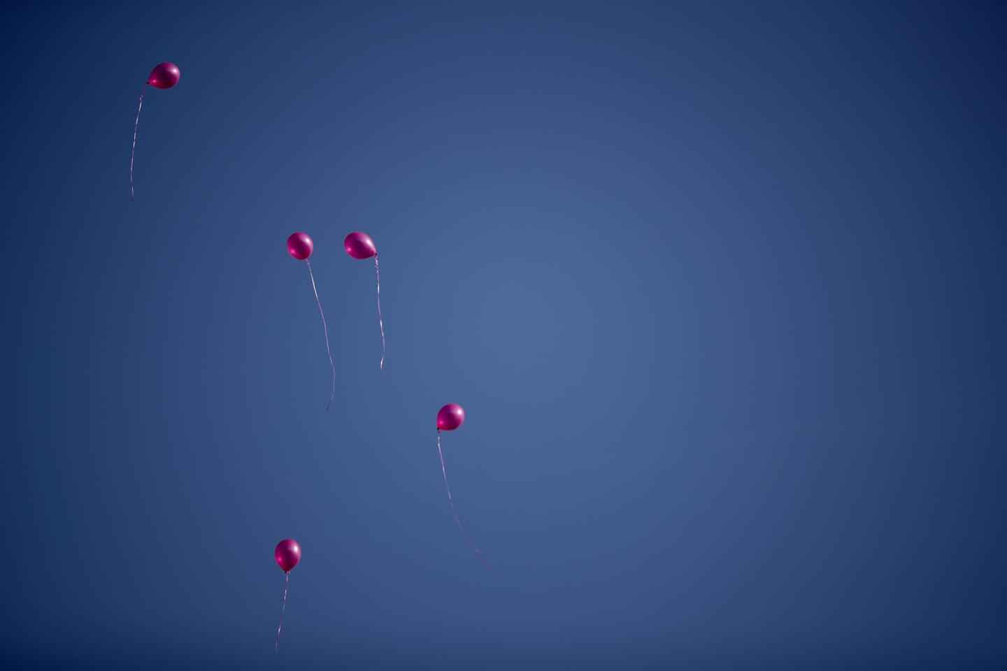 Pink balloons are released into the sky above tributes in St. Ann's Square on May 24, 2017, in Manchester.