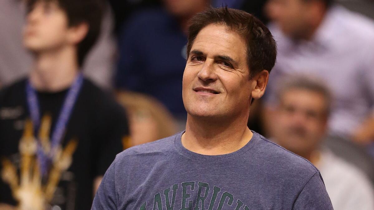 Dallas Mavericks owner Mark Cuban attends a game against the Phoenix Suns in January 2014.
