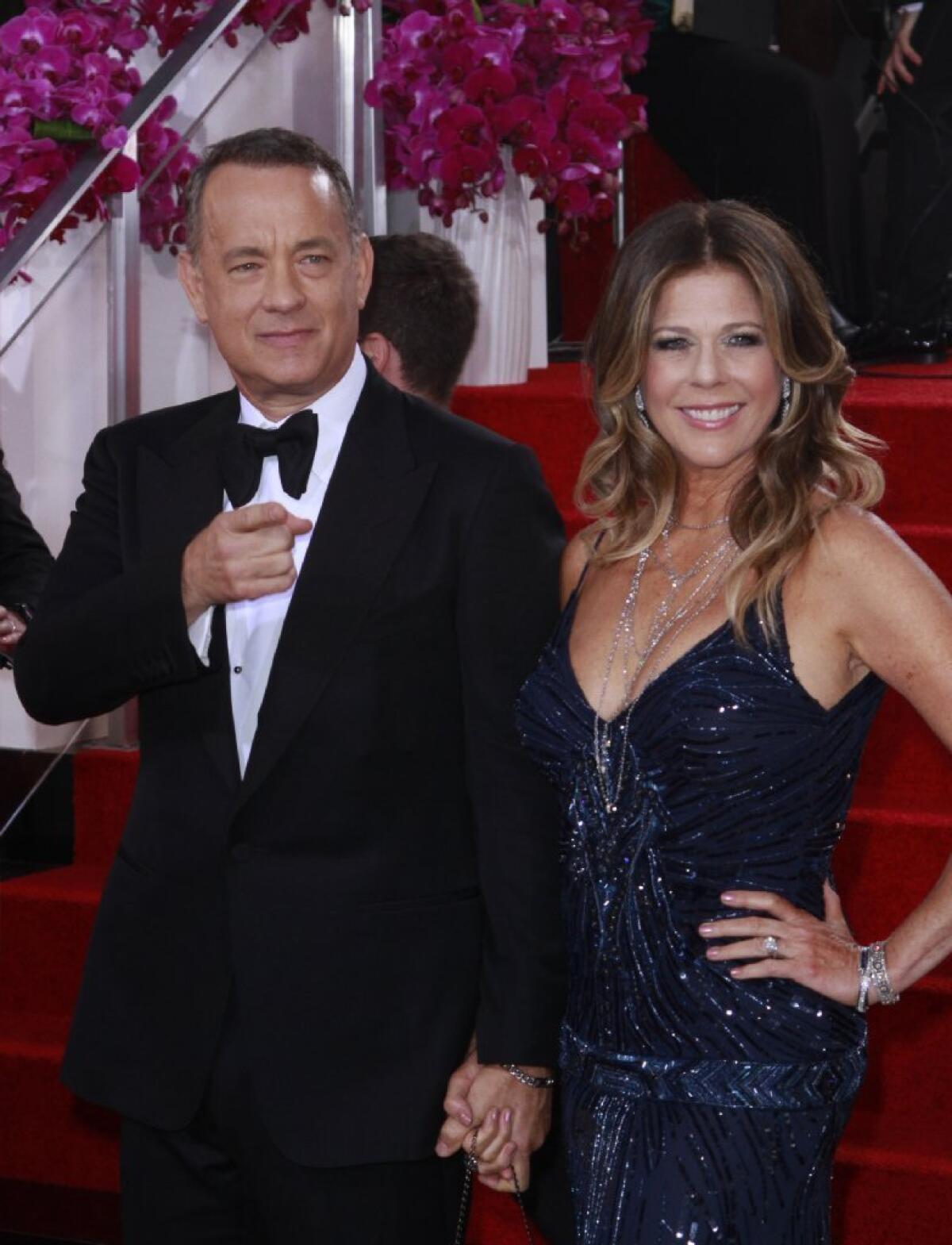 Tom Hanks and Rita Wilson arrive for the 71st Annual Golden Globe Awards show at the Beverly Hilton Hotel on Jan. 12, 2014.