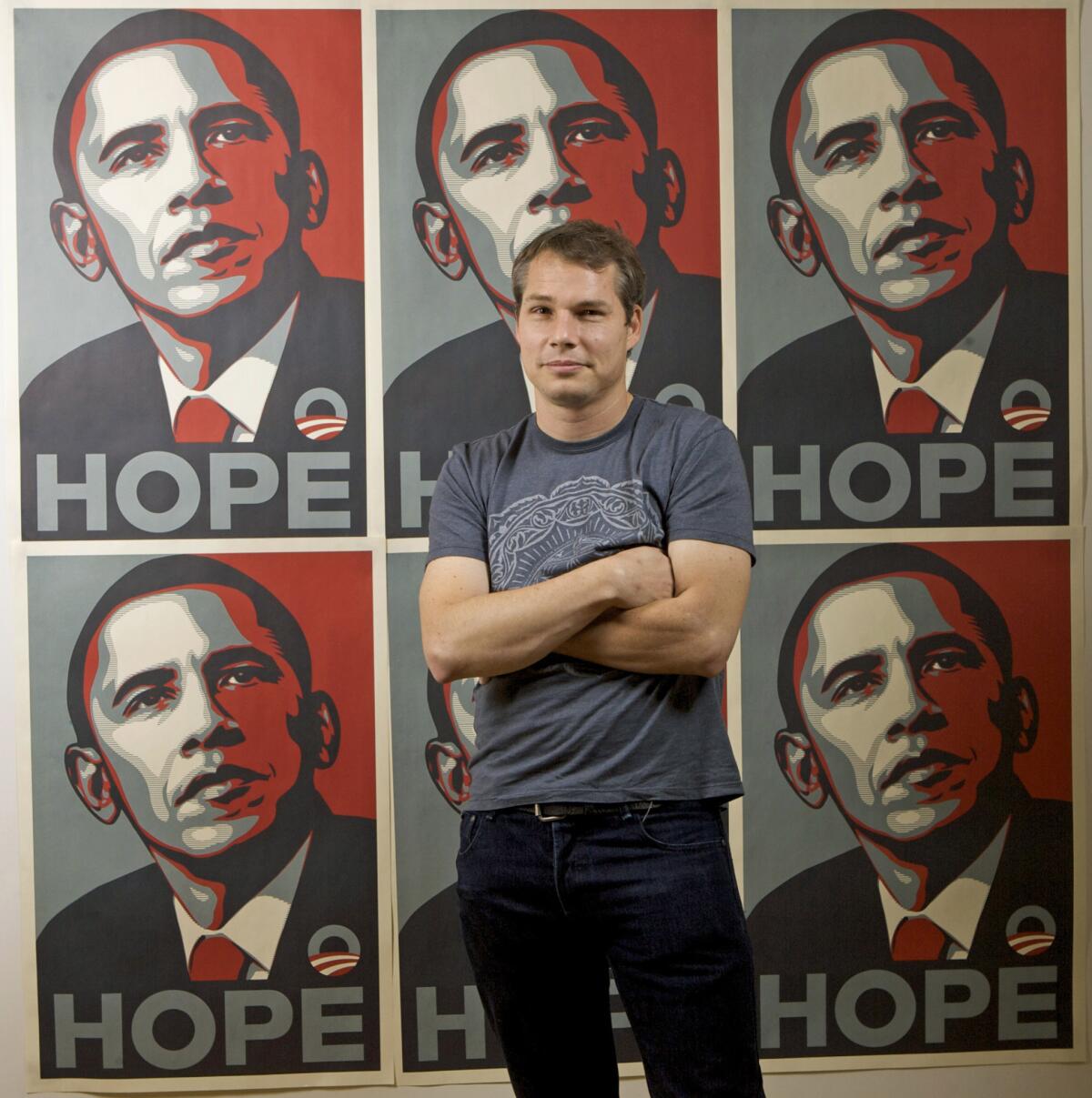 Los Angeles street artist Shepard Fairey in front of the Barack Obama "hope" artwork for which he is most famous.