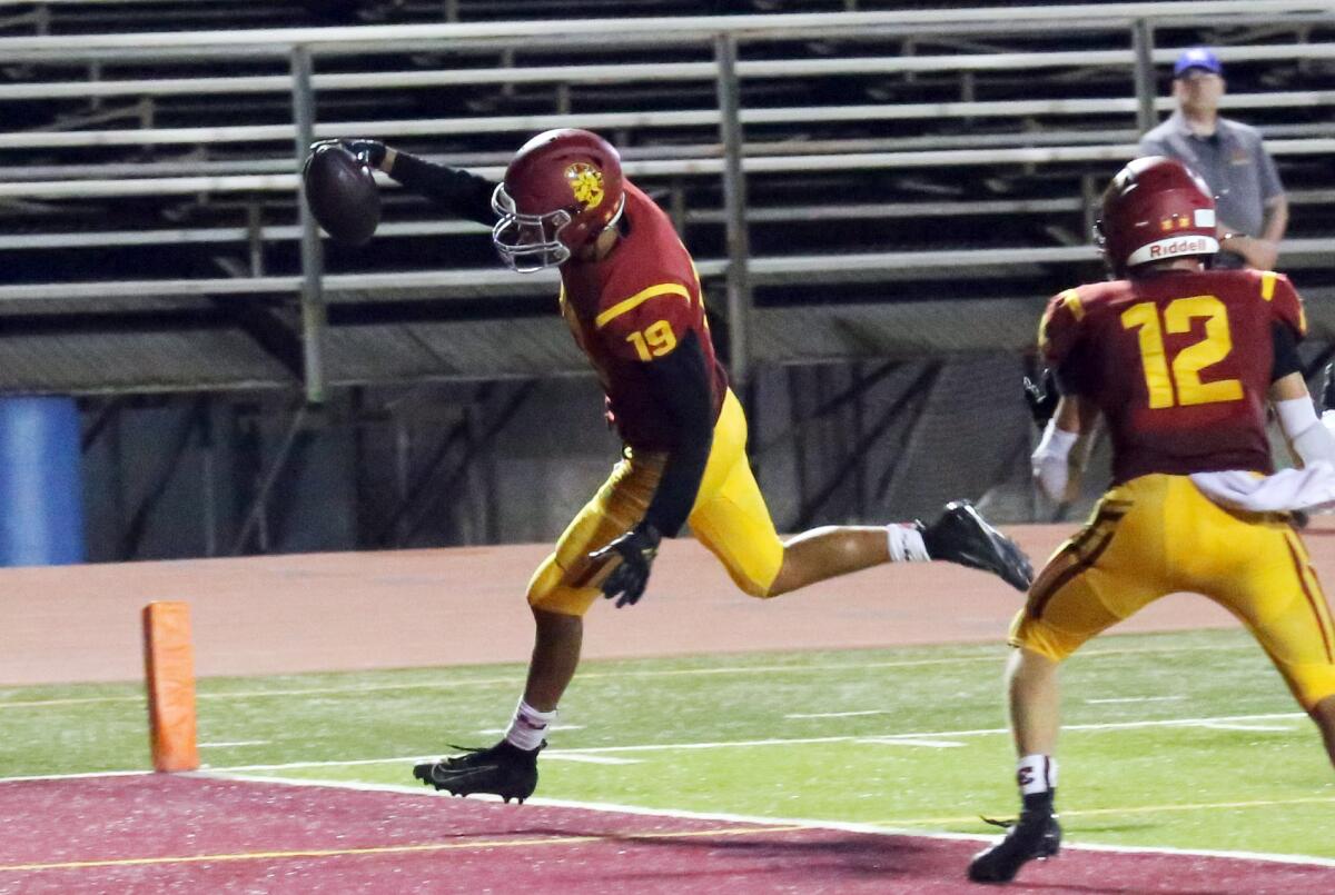 La Canada High's wide receiver Justin Zoltzman makes a reception for a touchdown in the beginning of the third quarter during La Canada High School boys football team against Glendale High School Boys football team in a nonleague game at La Canada High School in La Canada Flintridge, Ca., Saturday, August 31, 2019. (photo by James Carbone)