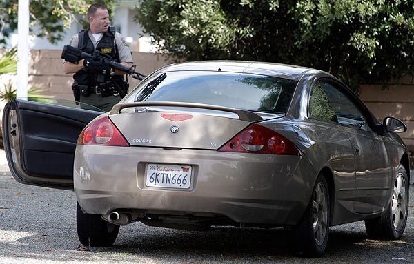 The vehicle that authorities say the suspect fled in in Cupertino, Calif. Authorities say a disgruntled employee opened fire, killing three people and wounding seven others. Santa Clara County sheriff's spokesman Jose Cardoza said the shooting at Lehigh Southwest Cement Co. occurred around 4 a.m. Wednesday.