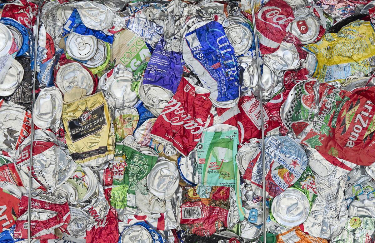 Crushed aluminum cans at a recycling center.