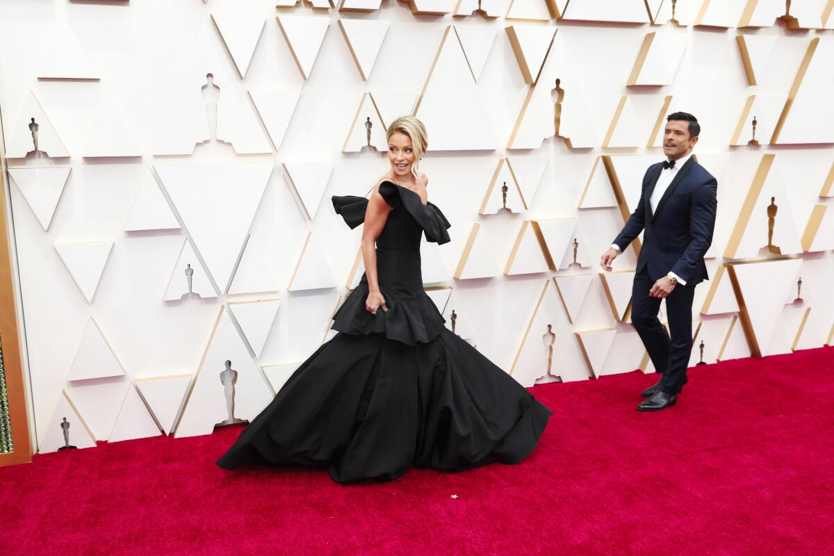 Kelly Ripa and Mark Consuelos arriving at the 92nd Academy Awards.