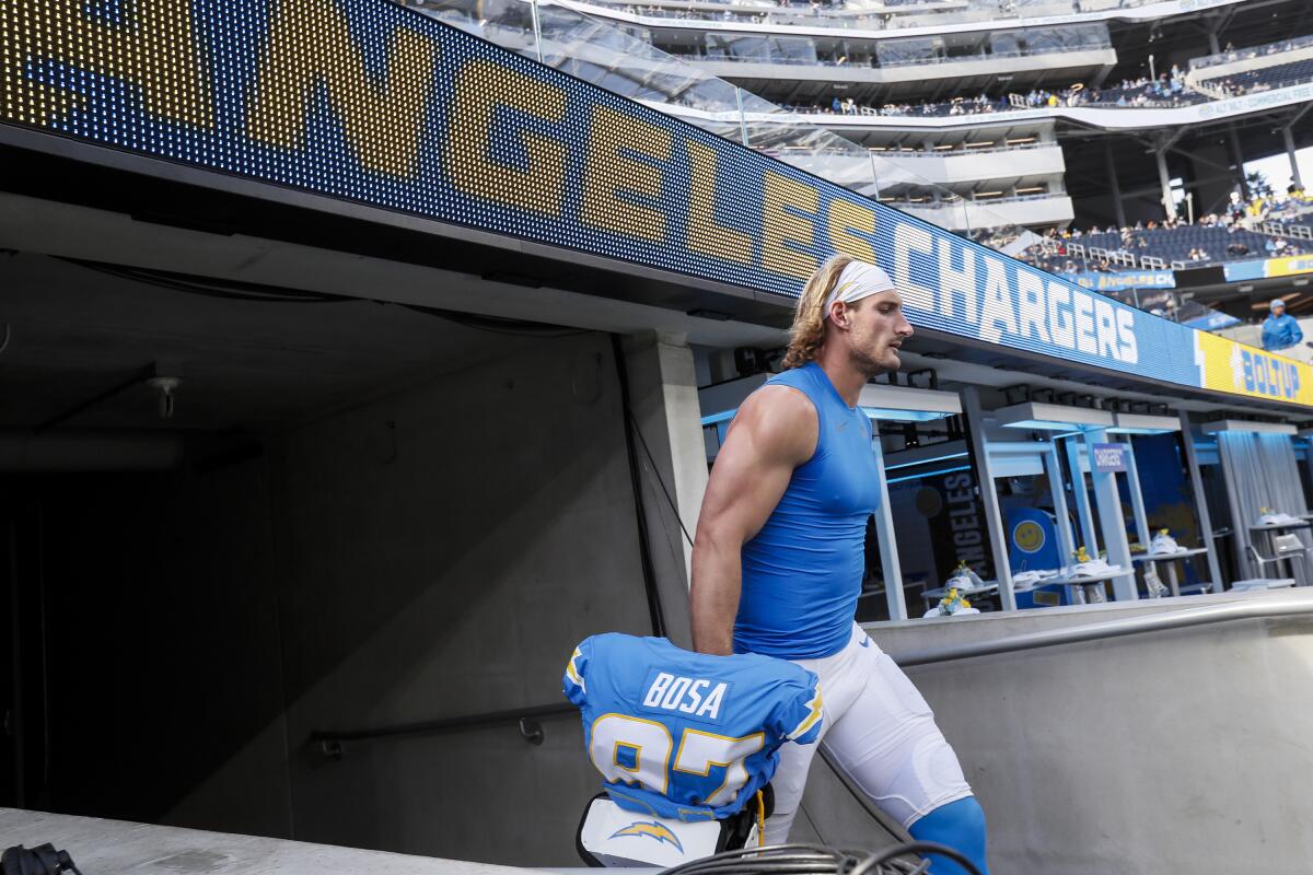 Chargers linebacker Joey Bosa prepares to warm up before a win over the Rams at SoFi Stadium on Jan. 1.