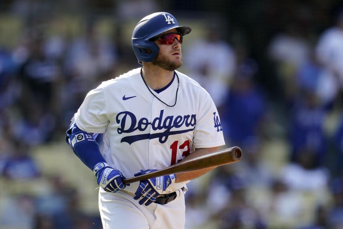 Max Muncy hits a three-run home run against the San Francisco Giants on Sept. 7.