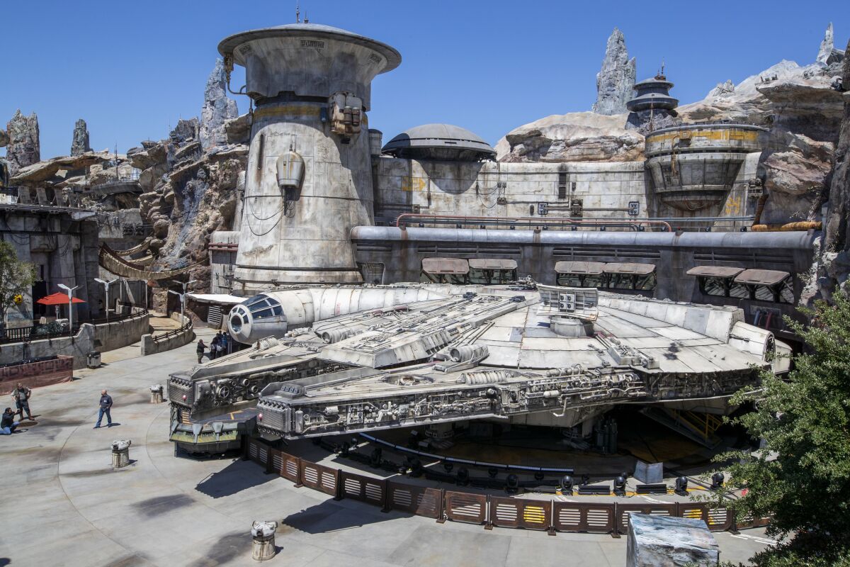 The Millennium Falcon sits at the heart of the in-real-life Galaxy's Edge at Disneyland.