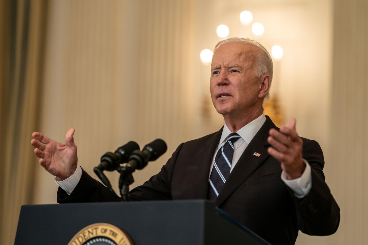 President Biden at the White House Thursday announcing new rules for private businesses with 100 or more employees. 