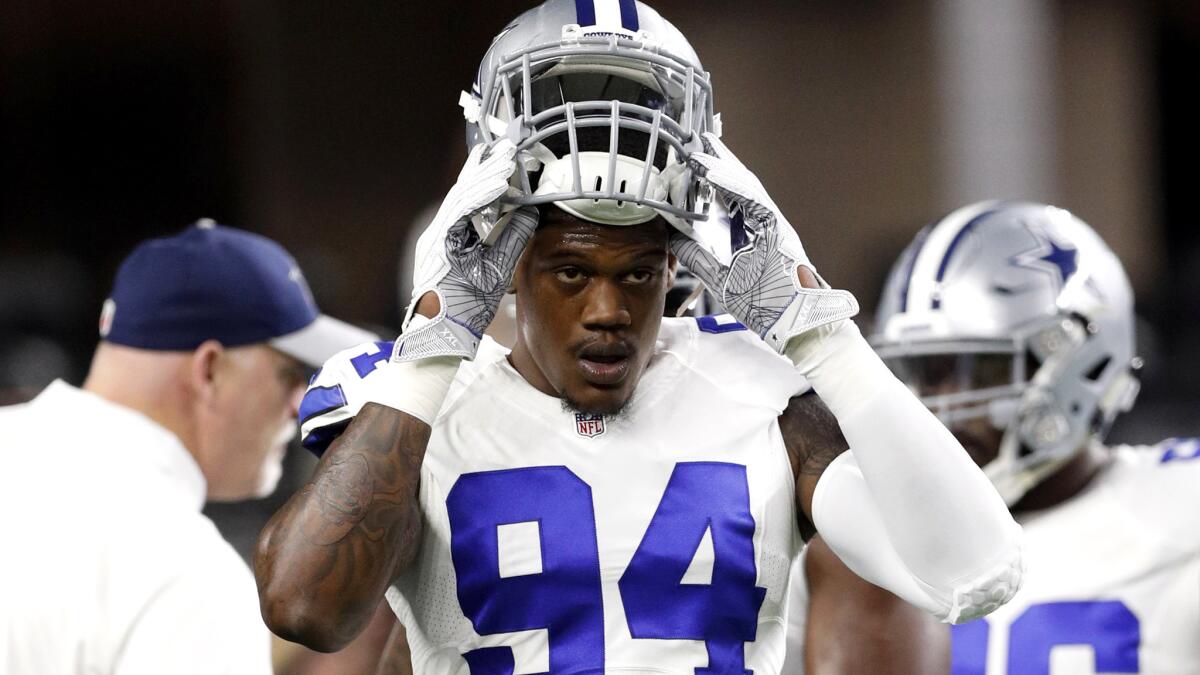 Cowboys defensive end Randy Gregory participates in warmups before Dallas game against the Detroit Lions on Dec. 26.