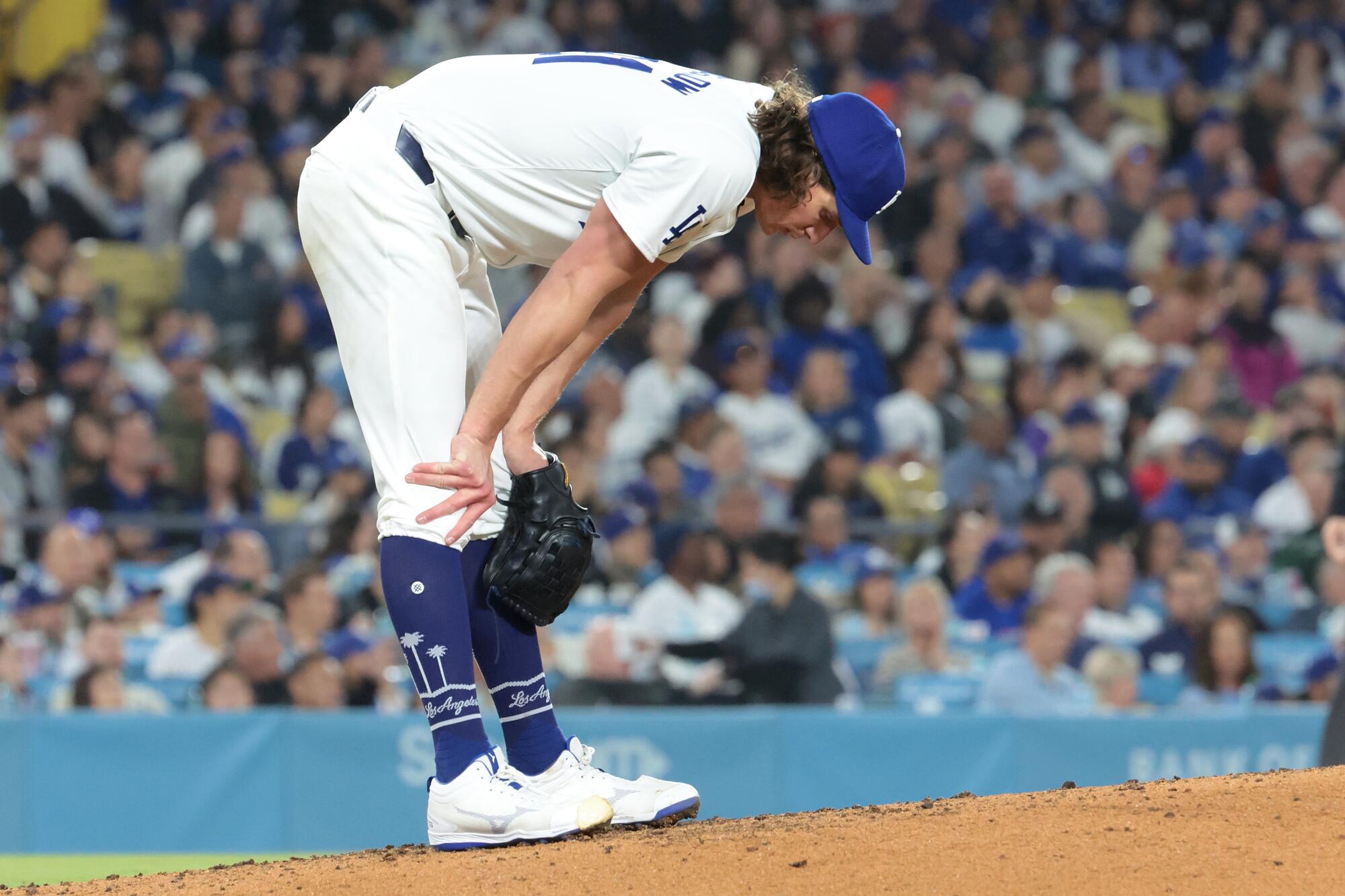 Dodgers pitcher Tyler Glasnow reacts after giving up a two-run triple against the Arizona Diamondbacks in May. 