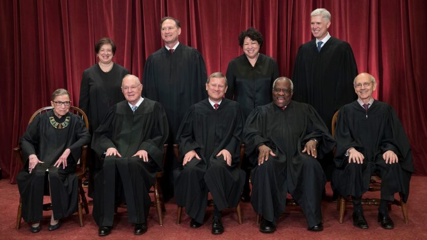 The justices of the U.S. Supreme Court at the Supreme Court Building in Washington on June 1.