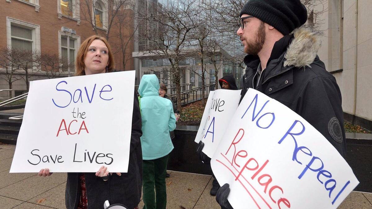 Protesters gather at the Federal Courthouse in Erie, Pa. on Jan. 12 to deliver signatures to U.S. Sen. Pat Toomey, R-Pa. urging him not to repeal the Affordable Care Act without a replacement.