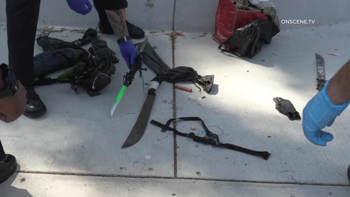 A machete and other items seized by police