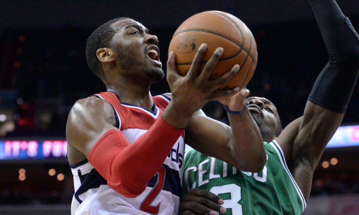 Washington Wizards point guard John Wall goes up for a shot during a loss to the Boston Celtics on Jan. 22.