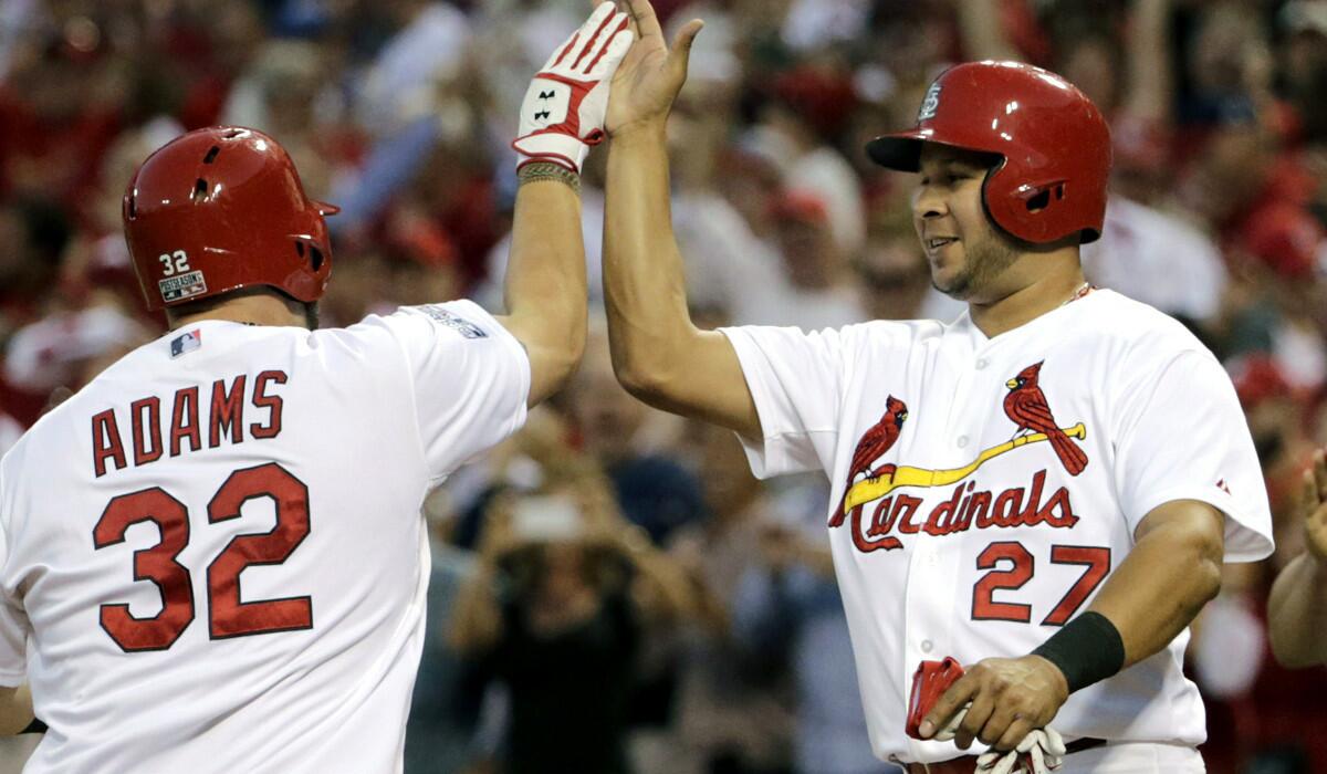 Although shortstop Jhonny Peralta (27) was a key free-agent acquisition this season, first baseman Matt Adams and others in the starting lineup are Cardinals prospects who have helped make up for the loss of slugger Albert Pujols.