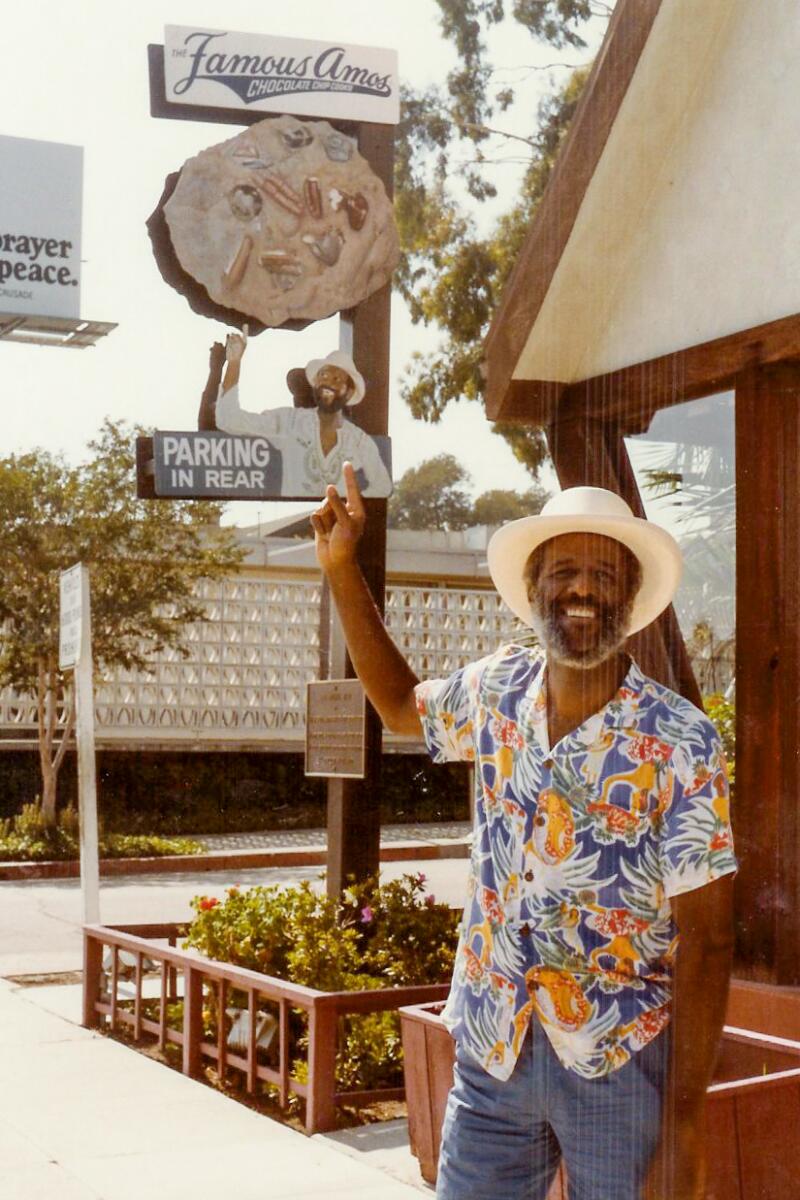 Wally Amos stands outside one of his cookie shops in Los Angeles.