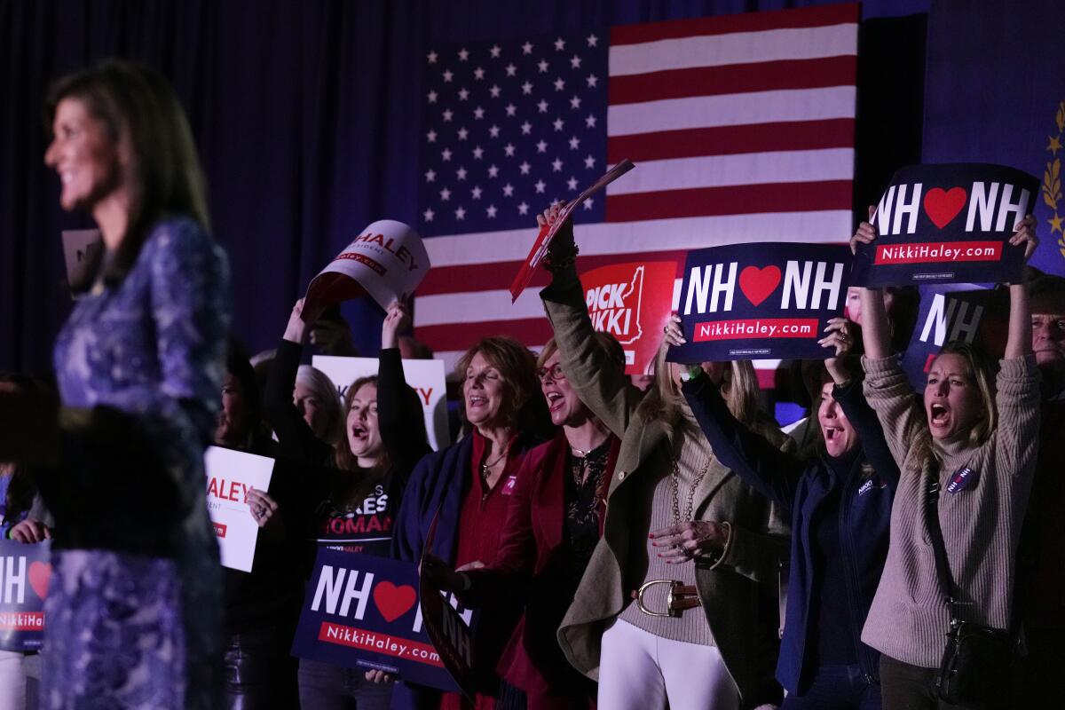 Presidential candidate Nikki Haley speaks before cheering supporters.