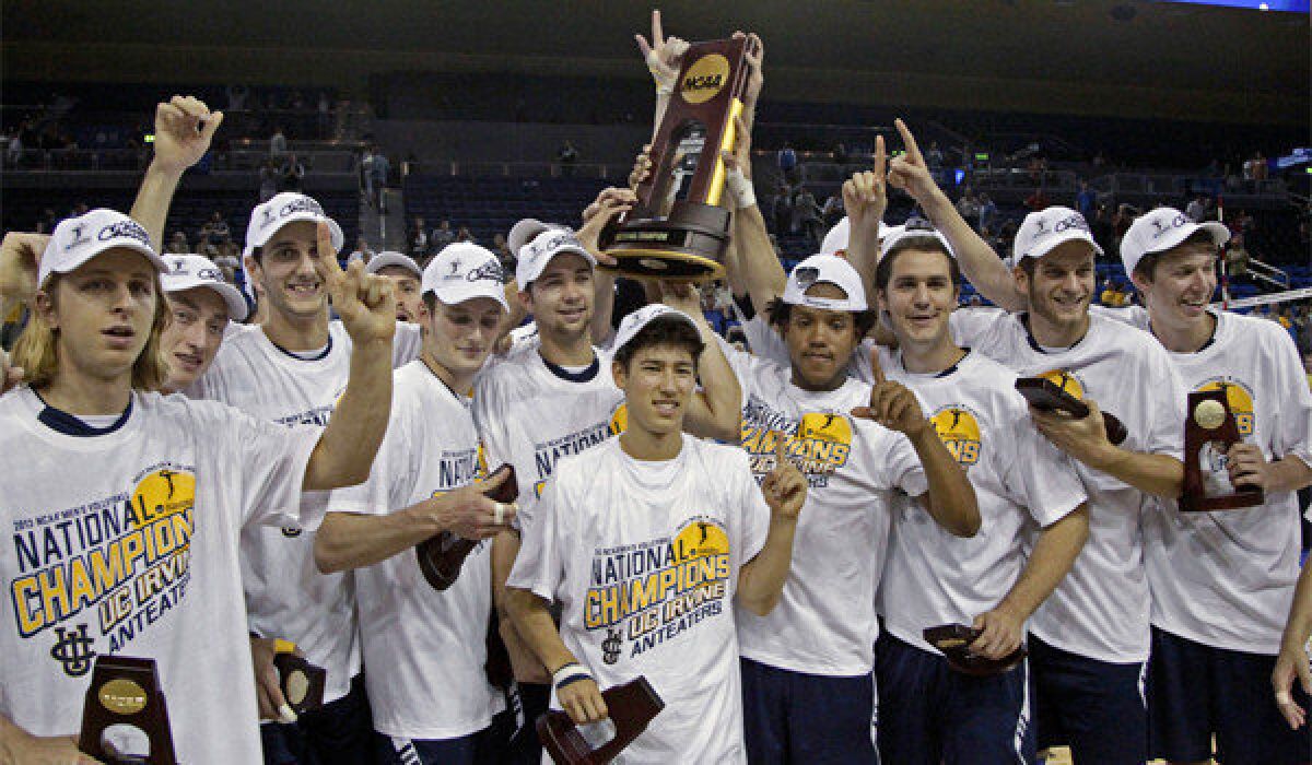 UC Irvine players celebrate after winning the team's second straight NCAA volleyball title with a 25-23, 25-22, 26-24 victory over BYU at Pauley Pavilion on Saturday.