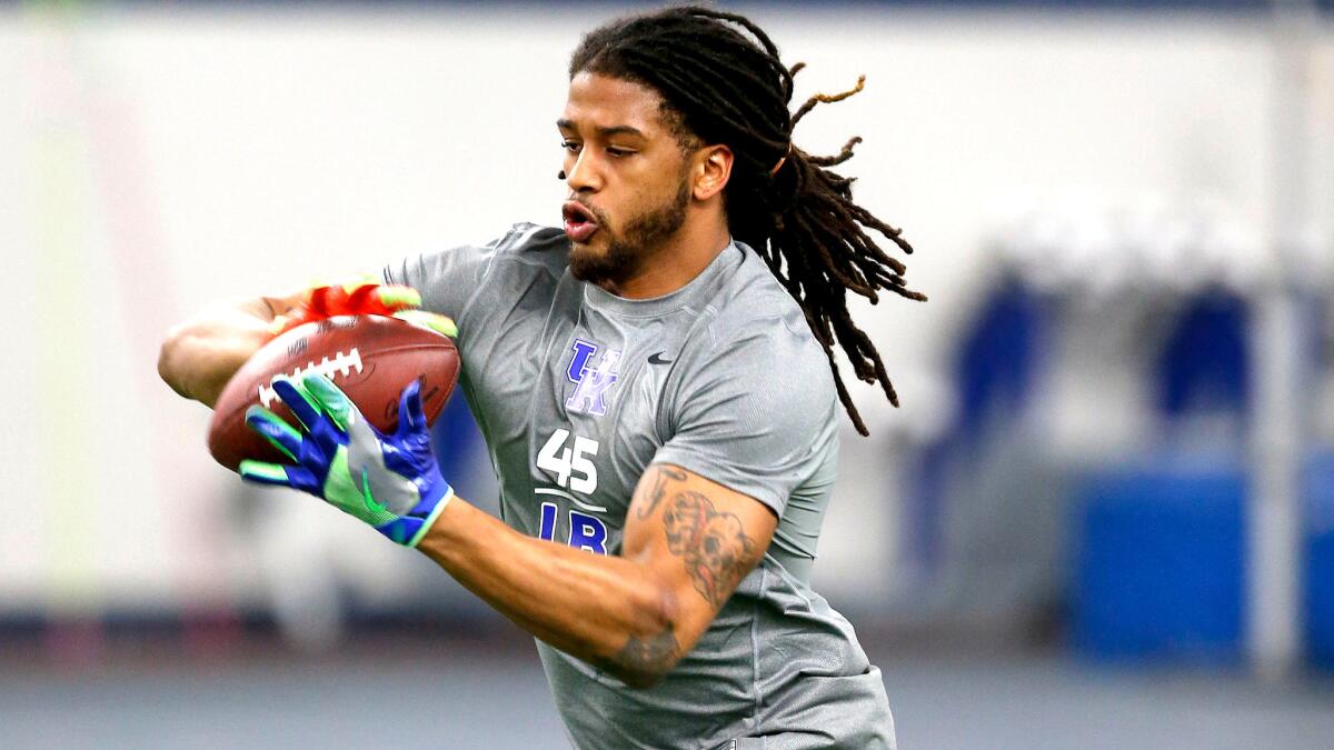 Linebacker Josh Forrest catches a pass during Kentucky's pro day last month.