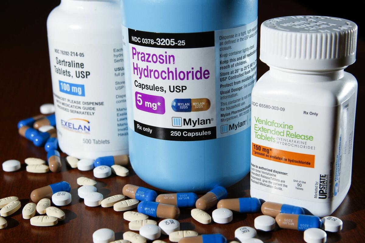 Three prescription drugs used for treating PTSD.