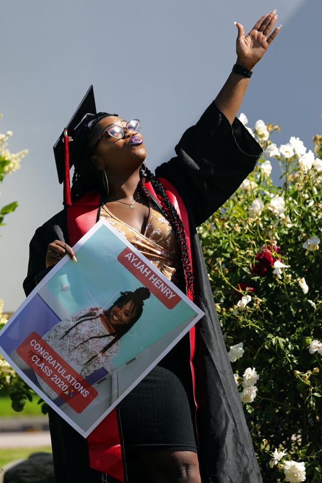 New graduate Ayjah Henry celebrates.