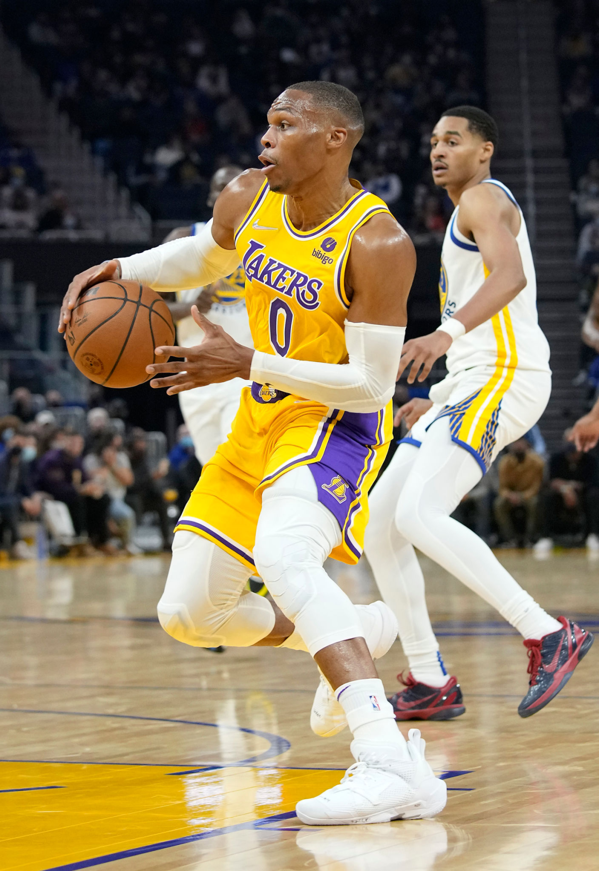 The Lakers' Russell Westbrook drives Friday against the Warriors at Chase Center. 