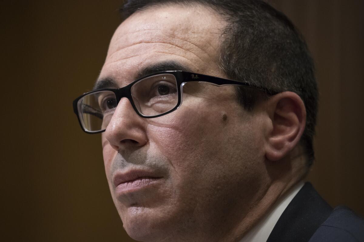 Treasury Secretary Steven T. Mnuchin testifies during his Senate confirmation hearing.