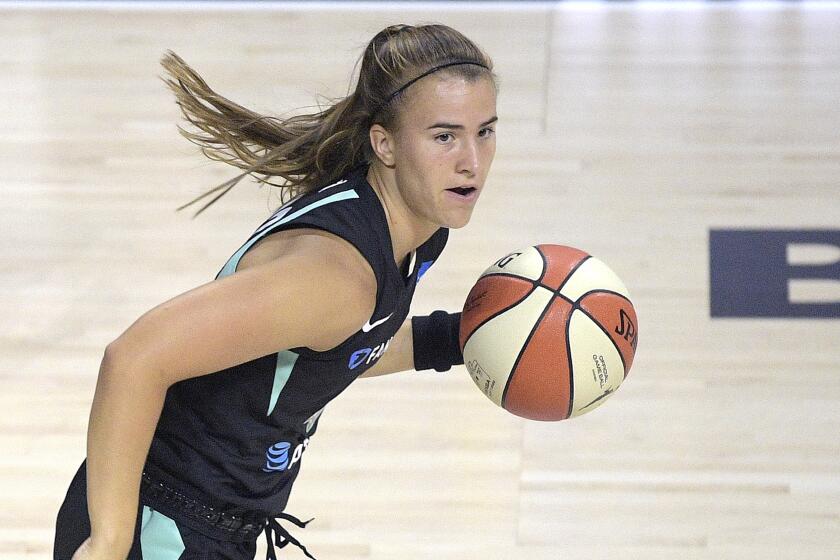New York Liberty guard Sabrina Ionescu (20) pushes the ball up the court during the first half of a WNBA basketball game against the Seattle Storm, Saturday, July 25, 2020, in Bradenton, Fla. (AP Photo/Phelan M. Ebenhack)