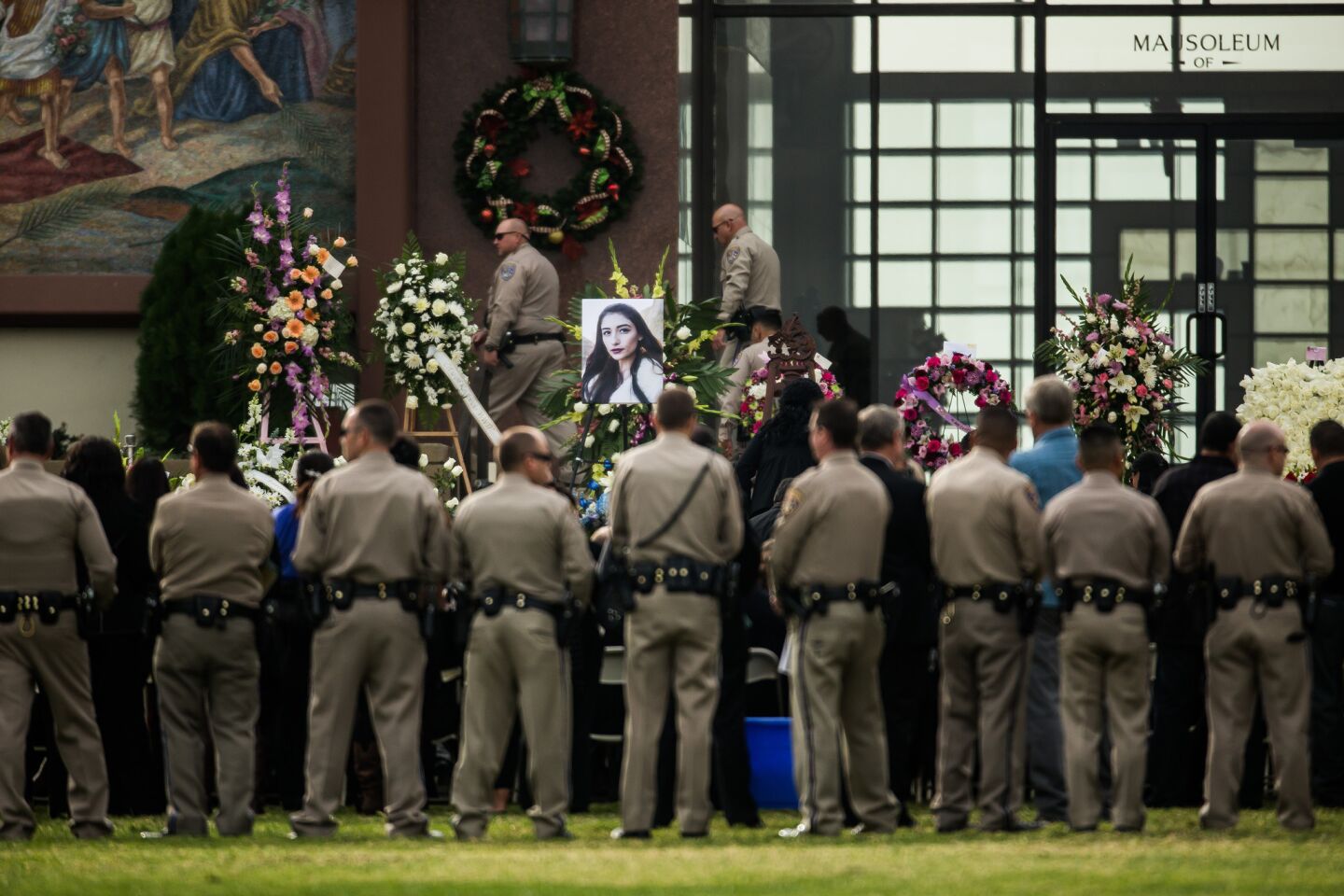 A portrait of Yvette Velasco, one of the victims of the deadly San Bernardino terrorist attacks, is placed at her funeral service at Forest Lawn Memorial Park, in Covina, Calif.
