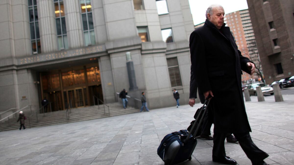 John Dowd leaves a New York courthouse in 2011.
