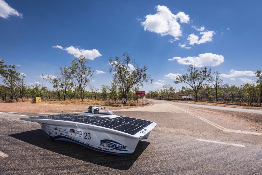 FILE - The GAMF Hungary car from Hungary competes during the first day of the 2015 World Solar Challenge near Katherine, Australia, on Sunday, Oct. 18, 2015. Australia’s new government is putting climate change at the top of its legislative agenda when Parliament sits next month for the first time since the May 21 election, with bills to enshrine a cut in greenhouse gas emissions and make electric cars cheaper, a minister said on Wednesday. (AP Photo/Geert Vanden Wijngaert, File)