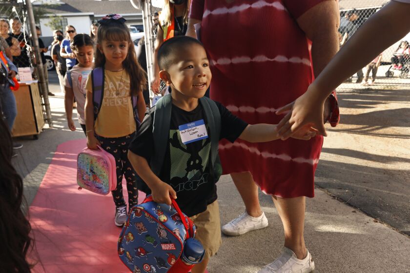 Los Angeles, Arleta, California-Aug. 15, 2022-Liam Hutchison enters kindergarden at Vena Ave. Elementary. Students from the Los Angeles Unified School District head to school at Vena Avenue Elementary & Gifted/High Ability Magnet on Aug. 15, 2022. (Carolyn Cole / Los Angeles Times)