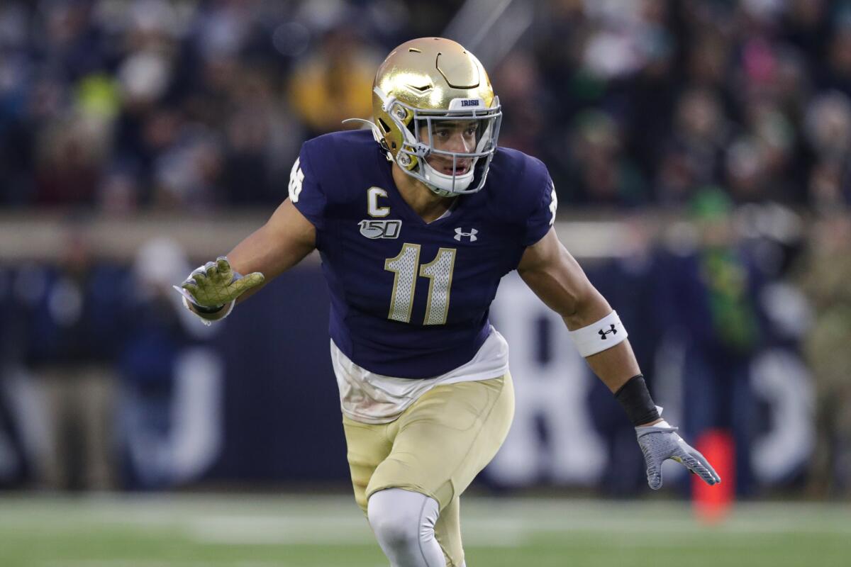 Notre Dame safety Alohi Gilman runs on the field.