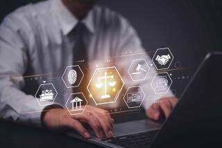 Businessman using a laptop with a digital law and justice interface