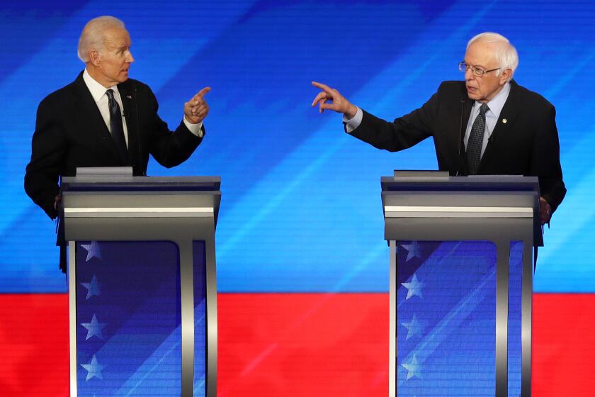 Democratic presidential candidates former Vice President Joe Biden and Sen. Bernie Sanders (I-VT) participate in the Democratic presidential primary debate in Manchester, New Hampshire.