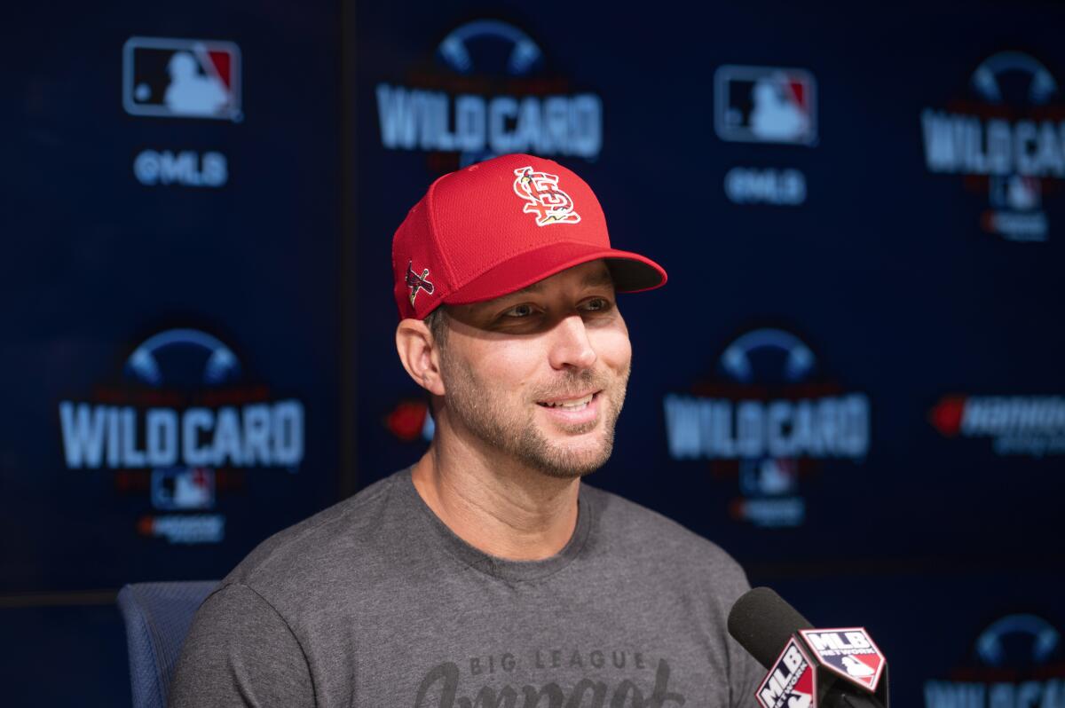 St. Louis Cardinals starting pitcher Adam Wainwright responds to a question during a baseball news conference in Los Angeles, Tuesday, Oct. 5, 2021. The Cardinals play the Los Angeles Dodgers in wild card playoff game on Wednesday. (AP Photo/Kyusung Gong)