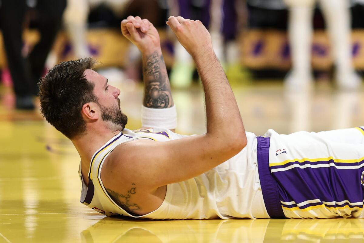 Luka Doncic fined $50,000 for 'inappropriate' gesture toward official - Los Angeles Times