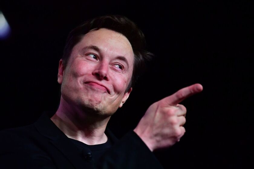 (FILES) In this file photo taken on March 14, 2019, Tesla CEO Elon Musk speaks during the unveiling of the new Tesla Model Y in Hawthorne, California. - Tesla on Monday, April 22, 2019 unveiled computer hardware for "full self-driving" capabilities as part of its strategy to bring autonomous cars to the mainstream. The chip announcement comes as Tesla races with Waymo, Uber and traditional automakers to bring autonomous vehicles to market. Chief executive Elon Musk said the new custom-designed chip, which he called the best available, was a significant milestone in self-driving. (Photo by Frederic J. BROWN / AFP)FREDERIC J. BROWN/AFP/Getty Images ** OUTS - ELSENT, FPG, CM - OUTS * NM, PH, VA if sourced by CT, LA or MoD **